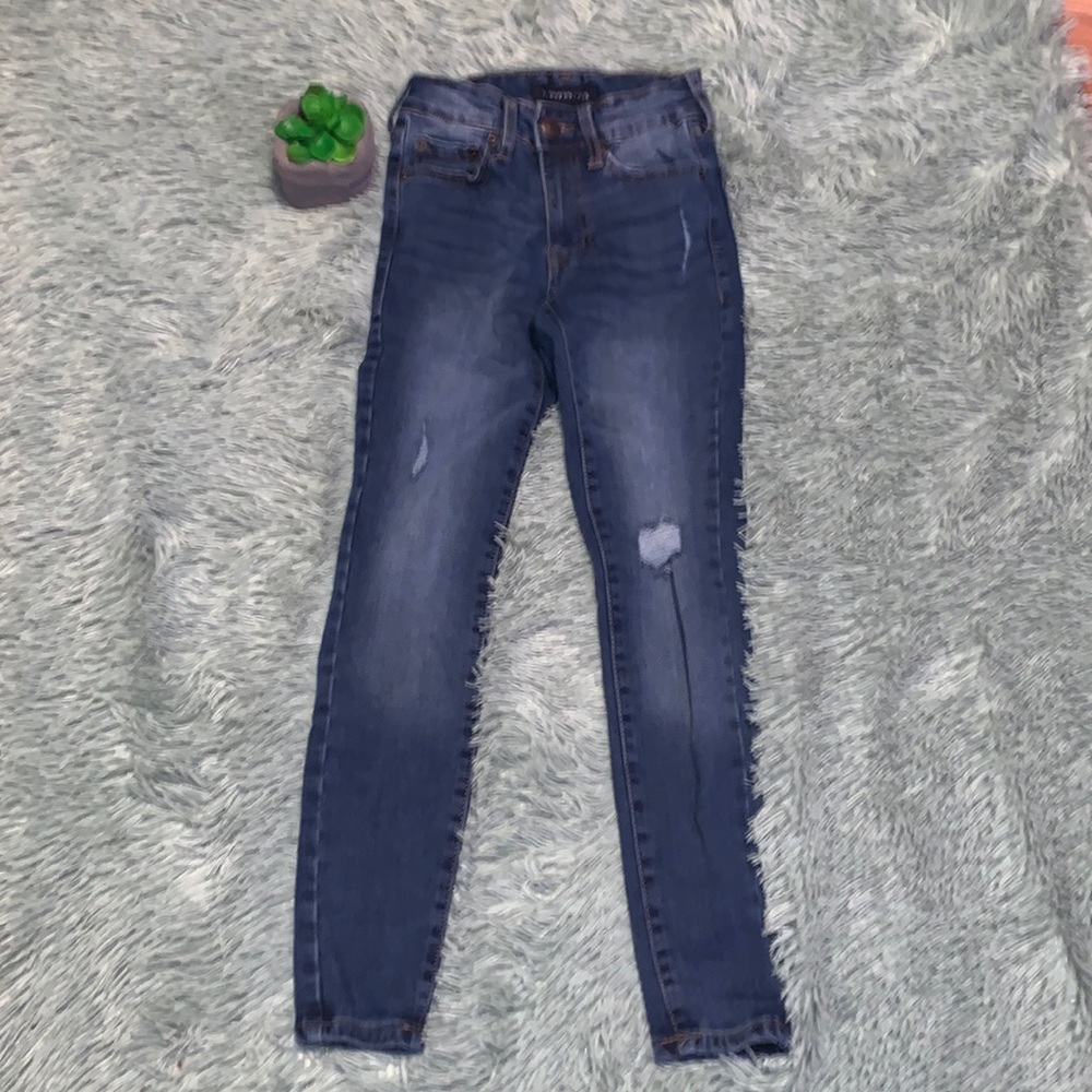 blue jeans (a couple rips) size 000